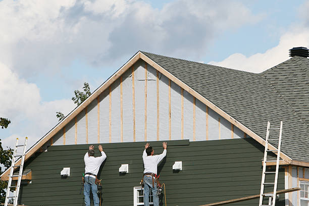 Professional Siding Installation technician working in McGrady, NC